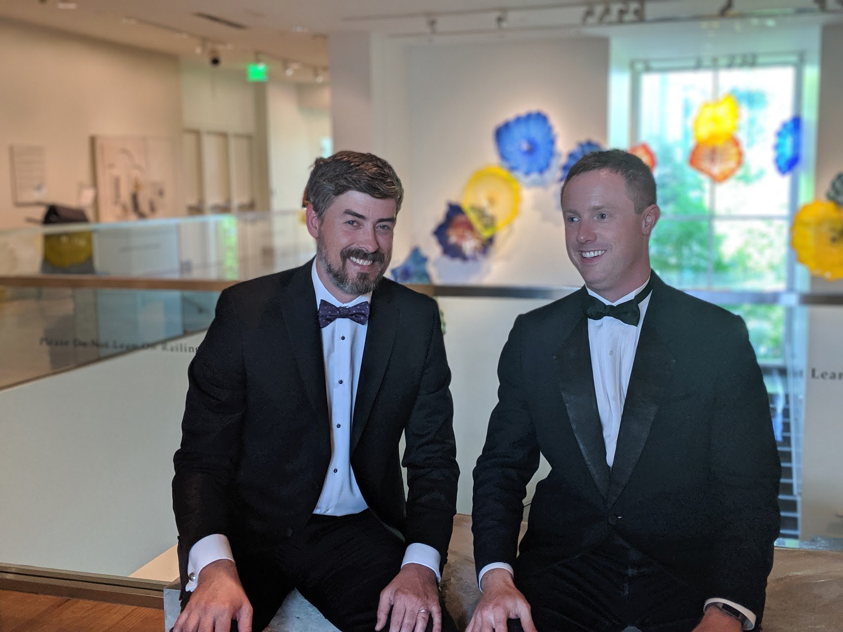 Conserv's CTO, Nathan McMinn and CEO, Austin Senseman wearing tuxedos at Conserv launch party