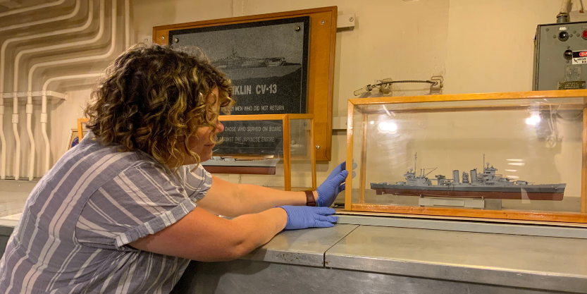 Announcing a New Partner! FAIC’s Collections Assessment for Preservation (CAP) Melissa King performing CAP at the USS Salem in Quincy, Massachussets. Photo credit: Lisa Goldberg
